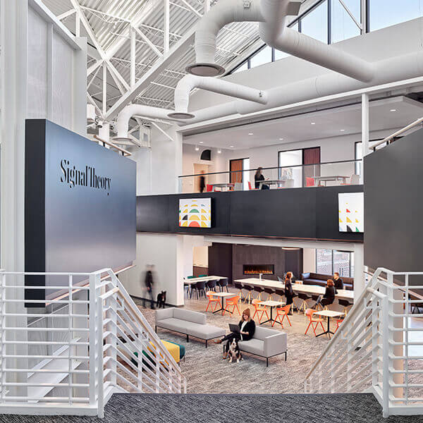 The lobby of a modern creative workplace facility.